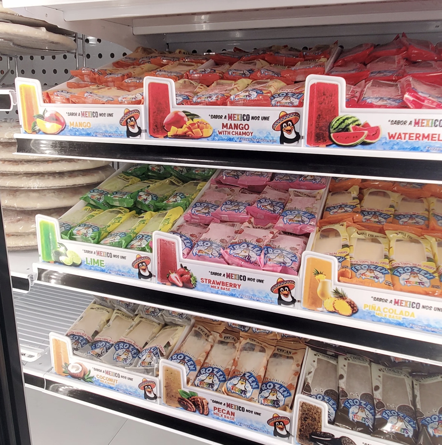 Branded vertical freezer display trays